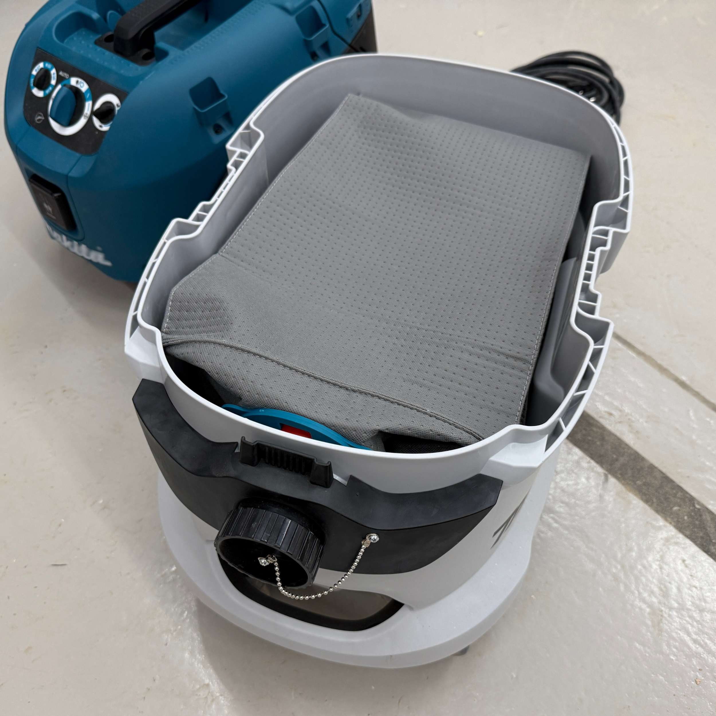 Reusable dust bag for Makita VC4210 laid flat showing full bag shape