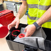 Reusable dust bag for Milwaukee M18 Fuel Packout emptied and shaken out for reuse
